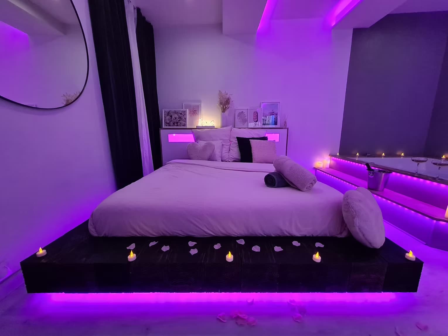 Suite B Spa bed in prestige package with purple mood, Prosecco and rose petals